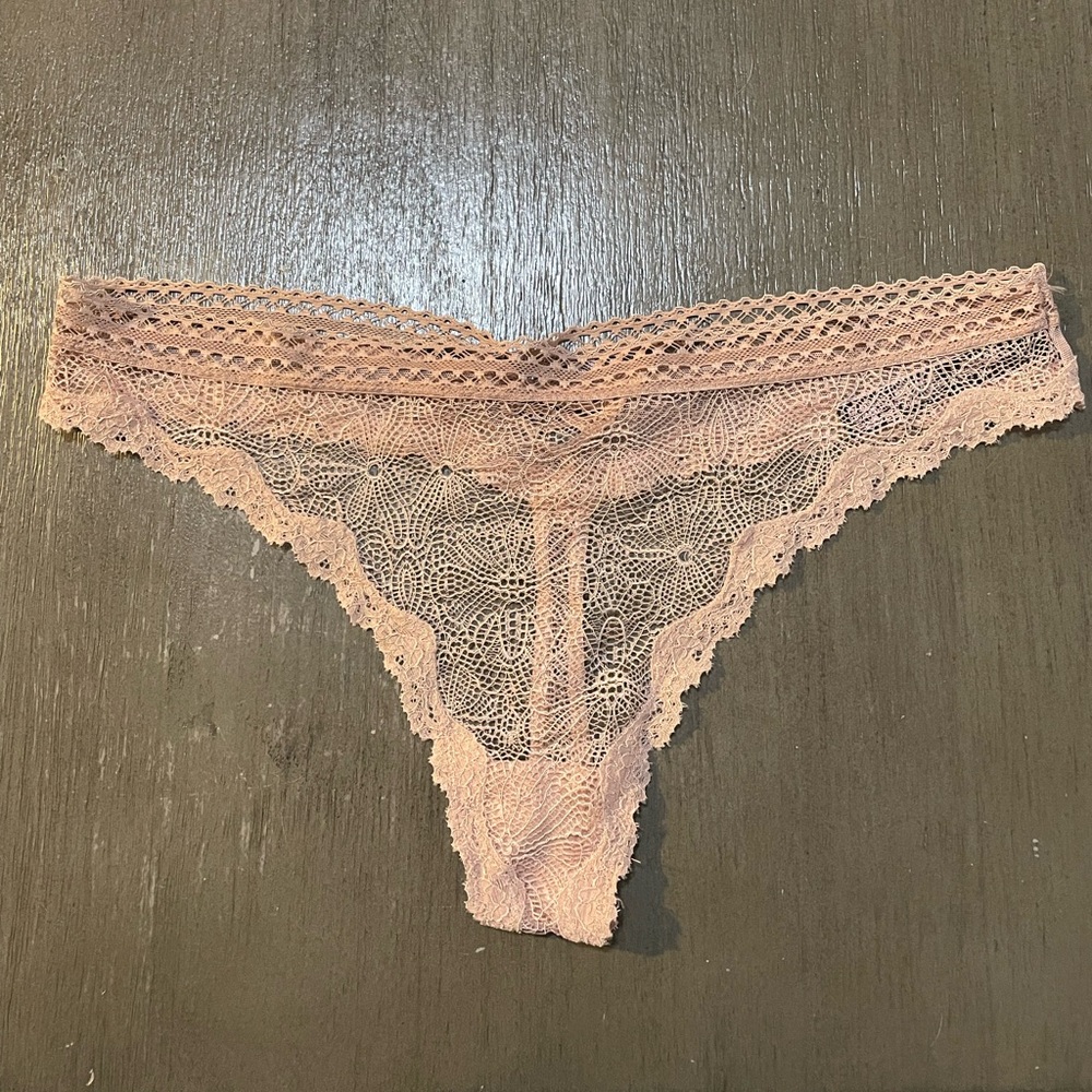 Vintage Victorias Secret very sexy thong. All lace. Size large. Tan/neutral